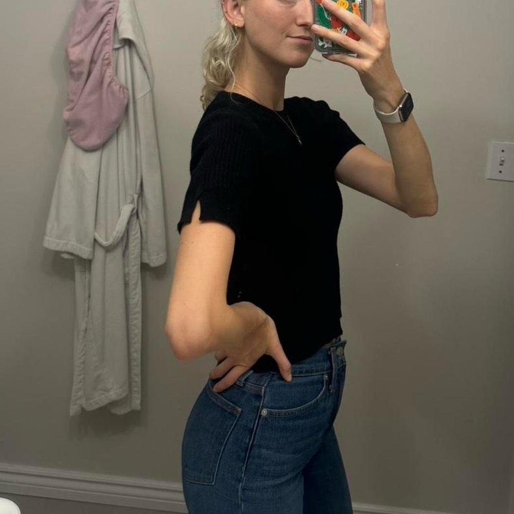 Francesca’s black, ribbed knit short sleeve top